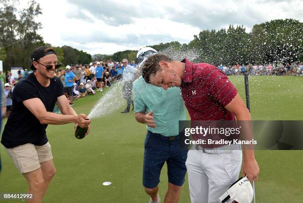 Cameron Smith of Australia is sprayed with champagne as he celebrates vicotry with his father Des during day four of the 2017 Australian PGA...