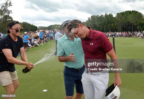 Cameron Smith of Australia is sprayed with champagne as he celebrates vicotry with his father Des during day four of the 2017 Australian PGA...