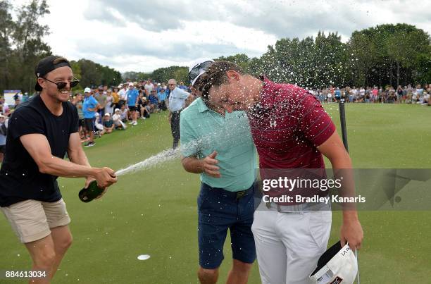 Cameron Smith of Australia is sprayed with champagne as he celebrates vicotry with his father Des during day four of the 2017 Australian PGA...