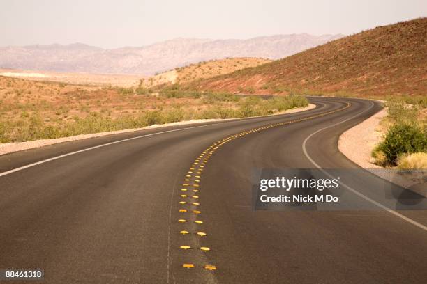 on the road - road reflector stock pictures, royalty-free photos & images