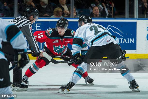 Brett Davis of the Kootenay Ice faces off against Kole Lind of the Kelowna Rockets during the second period on December 2, 2017 at Prospera Place in...