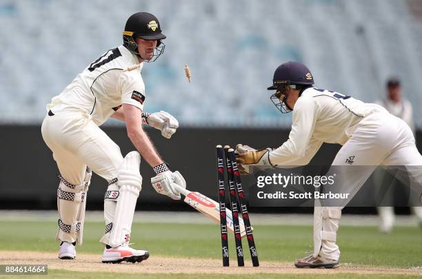 Ashton Turner of Western Australia is out stumped by wicketkeeper Seb Gotch of Victoria during day one of the Sheffield Shield match between Victoria...