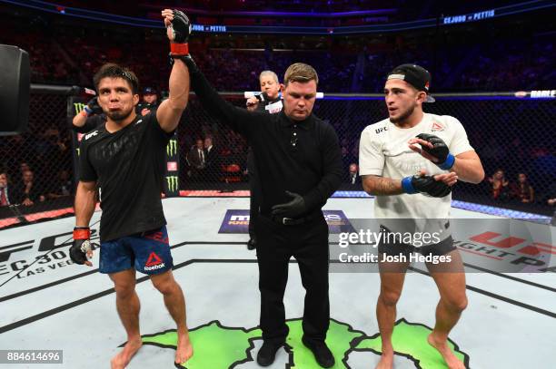 Henry Cejudo celebrates after defeating Sergio Pettis in their flyweight bout during the UFC 218 event inside Little Caesars Arena on December 02,...