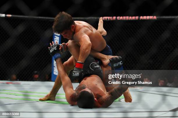 Henry Cejudo battles Sergio Pettis during UFC 218 at Little Ceasars Arena on December 2, 2018 in Detroit, Michigan.