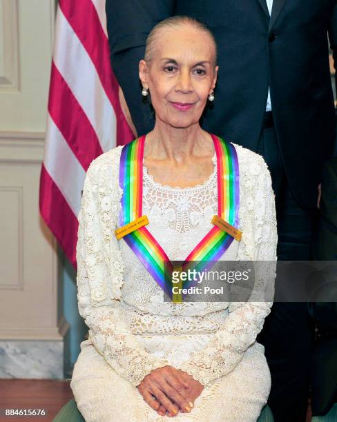 Carmen de Lavallade, one of he five recipients of the 40th Annual Kennedy Center Honors with her award as she poses for a group photo following a...