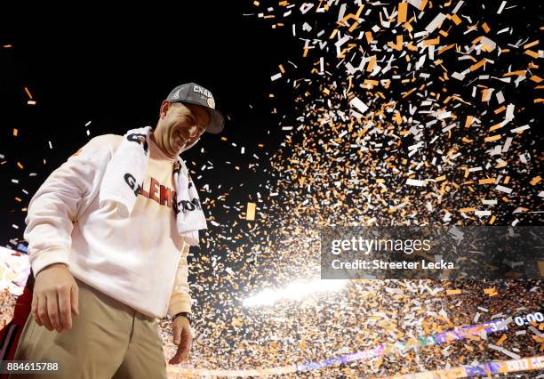 Head coach Dabo Swinney of the Clemson Tigers celebrates after defeating the Miami Hurricanes 38-3 in the ACC Football Championship at Bank of...