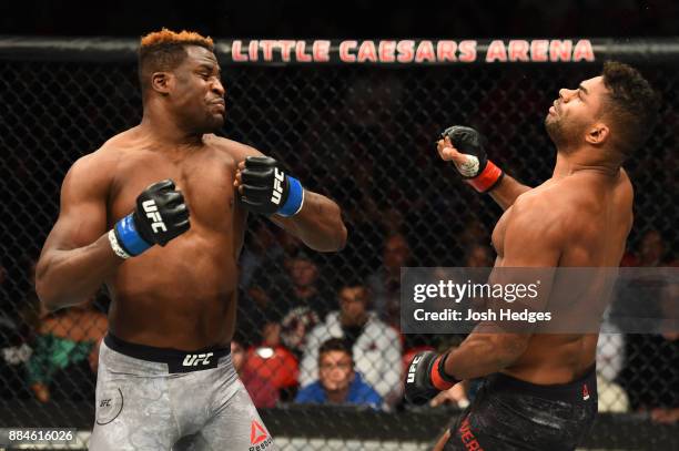 Francis Ngannou of Cameroon punches Alistair Overeem of The Netherlands in their heavyweight bout during the UFC 218 event inside Little Caesars...