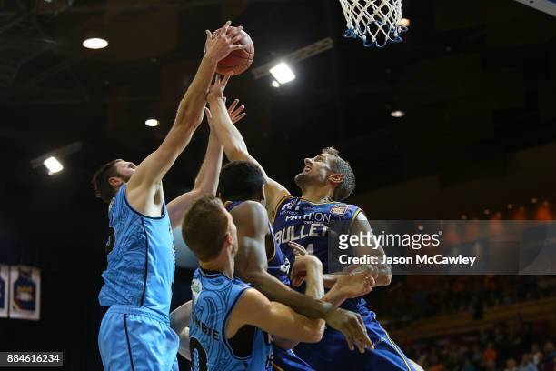 Daniel Kickert of the Bullets competes for the ball during the round eight NBL match between the Brisbane Bullets and the New Zealand Breakers at...