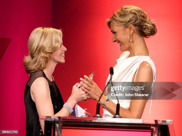 MaxMar's owner Nicola Maramotti presents actress Elizabeth Banks the MaxMara Face of the Future award onstage at the Women In Film 2009 Crystal +...