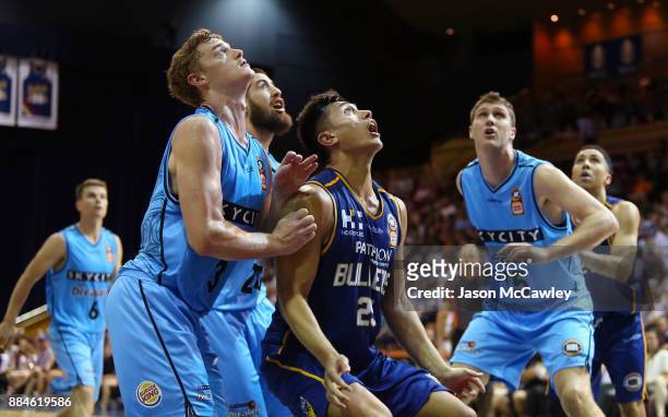 Finn Delany of the Breakers and Reuben Te Rangi of the Bullets compete for the ball during the round eight NBL match between the Brisbane Bullets and...