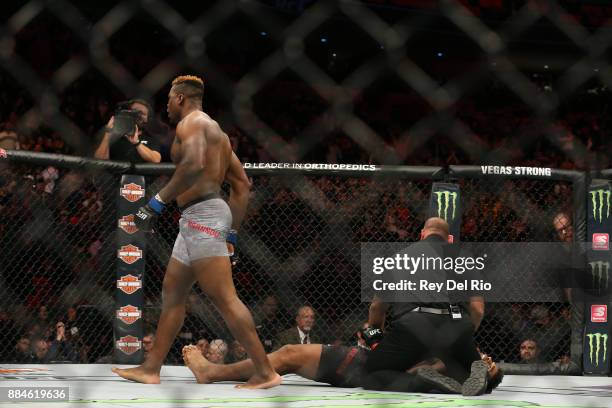 Francis Ngannou punches Alex Oliveira during the UFC 218 event at Little Caesars Arena on December 2, 2017 in Detroit, Michigan.