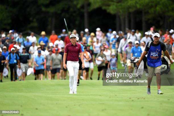 Cameron Smith of Australia walks down the 18th hole as the crowd gathers behind him during day four of the 2017 Australian PGA Championship at Royal...