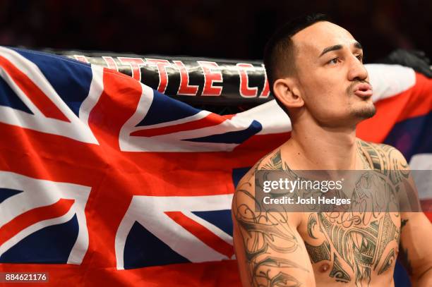 Max Holloway stands in his corner prior to facing Jose Aldo of Brazil in their UFC featherweight championship bout during the UFC 218 event inside...
