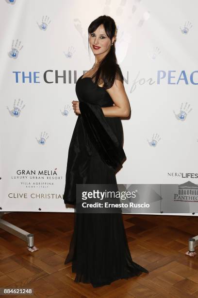Isabelle Adriani arrives for the Children for Peace Gala Dinner at Cardinal Gallery on December 2, 2017 in Rome, Italy.