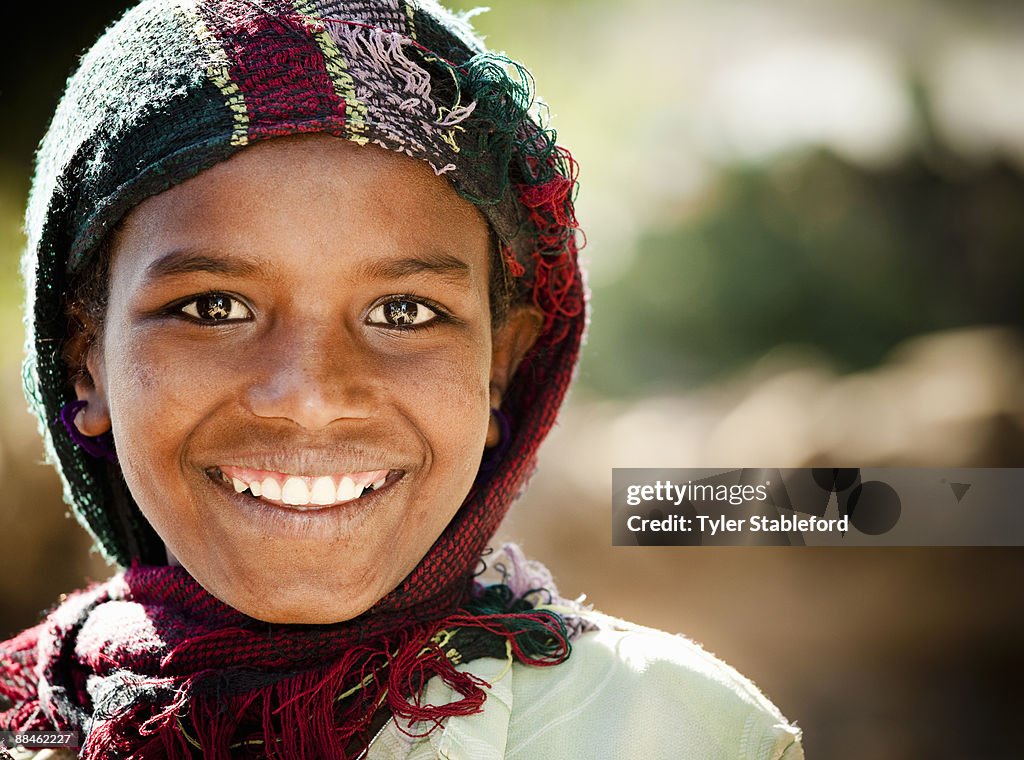 Smiling Ethiopian girl with shawl.