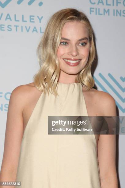 Actress Margot Robbie arrives on the red carpet for a premiere of "I, Tonya" at the Christopher B. Smith Rafael Film Center on December 2, 2017 in...