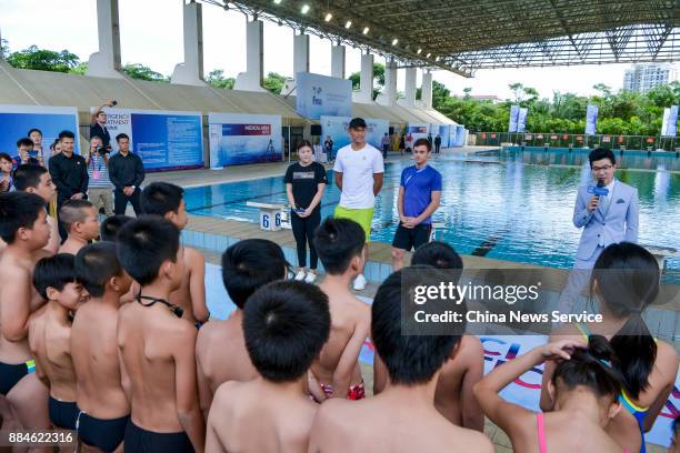 Chinese swimmer Sun Yang and British diver Tom Daley attend the FINA Open Class With The Aquatic Stars on December 2, 2017 in Sanya, Hainan Province...