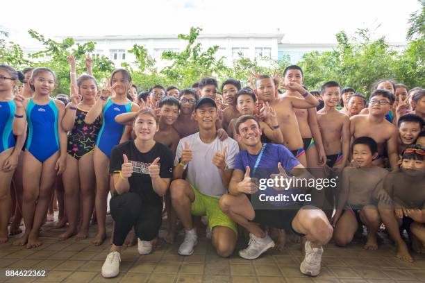 Chinese swimmer Sun Yang and British diver Tom Daley attend the FINA Open Class With The Aquatic Stars on December 2, 2017 in Sanya, Hainan Province...