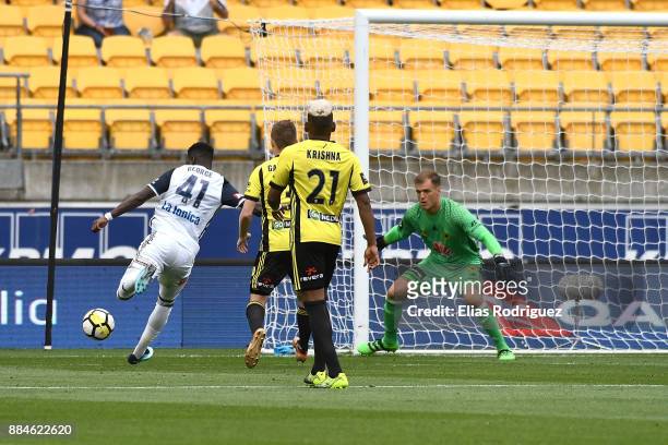 Leroy George of Melbourne Victory shoots looking to get one past Lewis Italiano of the Wellington Phoenix during the round nine A-League match...