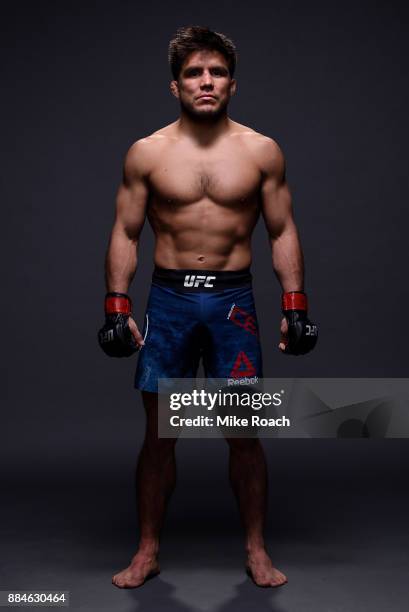 Henry Cejudo poses for a post fight portrait backstage during the UFC 218 event inside Little Caesars Arena on December 02, 2017 in Detroit, Michigan.