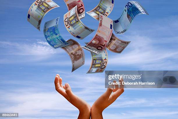 euros fall from the sky - pennies from heaven stock pictures, royalty-free photos & images