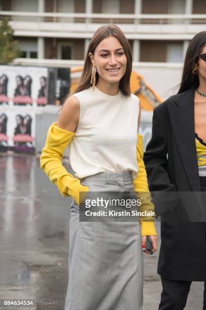 Fashion designers and Co Founder of fashion label Attico Giorgia Tordini wears a Calvin Klein top and skirt and Loewe earrings day 5 of Paris Womens...