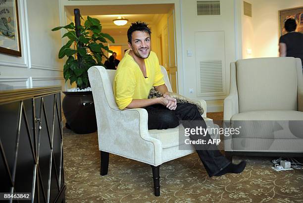 Singer and British TV personality Peter Andre talks to the media in his room at the Venetian Hotel on the third and final day of the 10th...