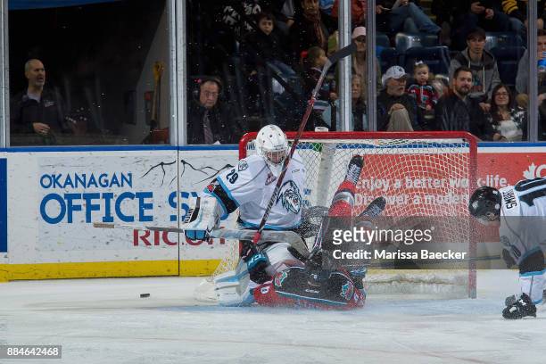Kole Lind of the Kelowna Rockets slides into the net of Bailey Brkin of the Kootenay Ice on December 2, 2017 at Prospera Place in Kelowna, British...