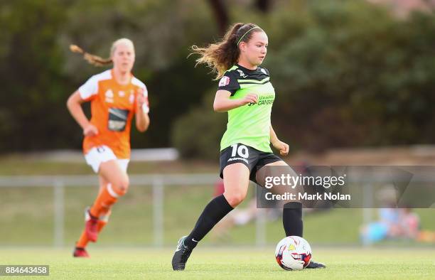 Grace Maher of Canberra in action during the round six W-League match between Canberra United and the Brisbane Roar at McKellar Park on December 3,...