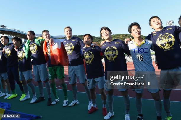 Tochigi SC players celebrate the promotion to the J2 after the J.League J3 match between Azul Claro Numazu and Tochigi SC at Ashitaka Stadium on...