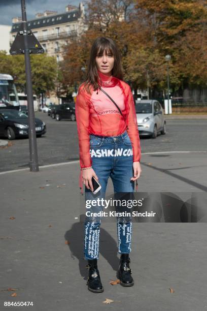 Fashion designer and founder of fashion label Anna K, Anna Karenina wears an Anna K blouse and jeans, Marc Jacobs bag and Balenciaga shoes day 5 of...