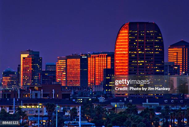 skyscrapers at sunset  - phoenix stock pictures, royalty-free photos & images