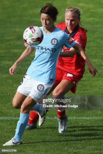 Yukari Kinga of the City controls the ball from Alyssa Mautz of United during the round six W-League match between Melbourne City and Adelaide United...