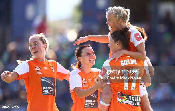 Tameka Butt of the Roar celebrates scoring a goal with team mates during the round six W-League match between Canberra United and the Brisbane Roar...