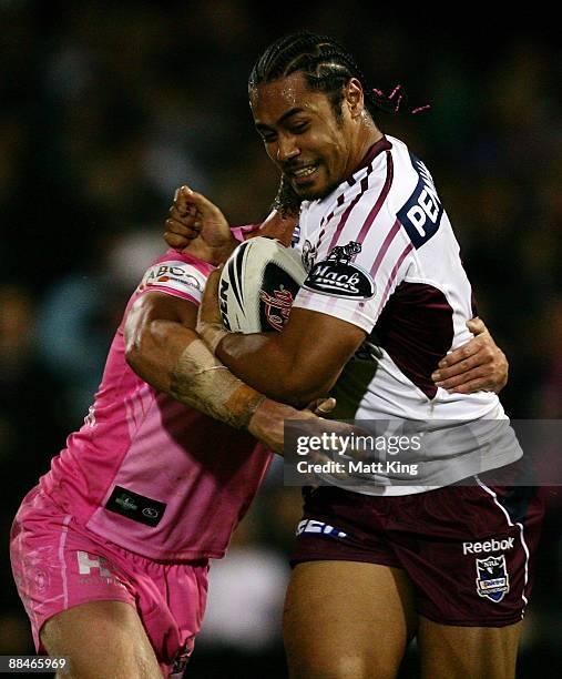 Steve Matai of the Sea Eagles takes on the defence during the round 14 NRL match between the Penrith Panthers and the Manly Warringah Sea Eagles at...