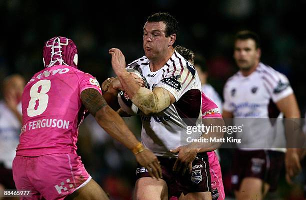 Jason King of the Sea Eagles runs at the defence during the round 14 NRL match between the Penrith Panthers and the Manly Warringah Sea Eagles at CUA...