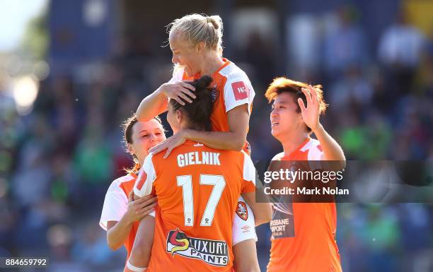 Tameka Butt of the Roar celebrates scoring a goal with team mates during the round six W-League match between Canberra United and the Brisbane Roar...