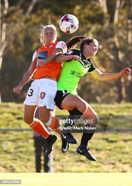 Tameka Butt of the Roar and Madelyn Whittall of Canberra contest possession during the round six W-League match between Canberra United and the...