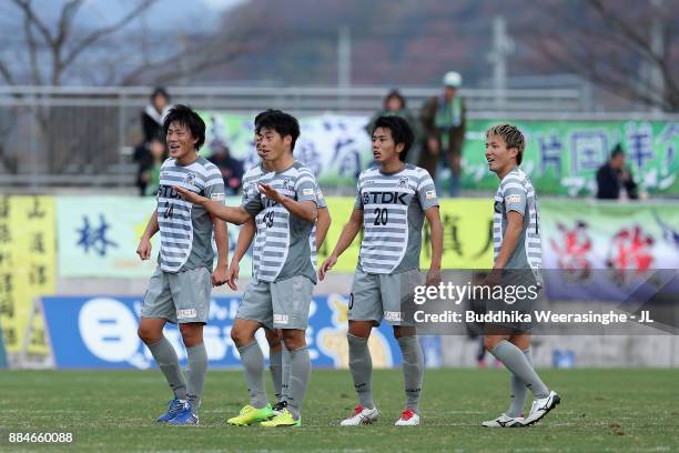 Blaublitz Akita players check the result of the game of Azul Claro Numazu and Tochigi SC at the final whistle of the J.League J3 match between...