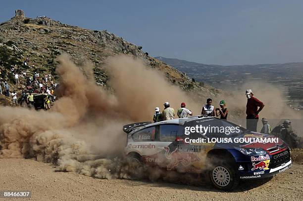 French Sebastien Loeb and Daniel Elena of Monaco speed up their Citroen C4 at Klenia-Mycenae special stage on the day two of the WRC Rally Acropolis...
