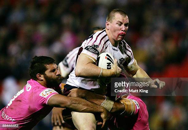 Glenn Hall of the Sea Eagles takes on the defence during the round 14 NRL match between the Penrith Panthers and the Manly Warringah Sea Eagles at...