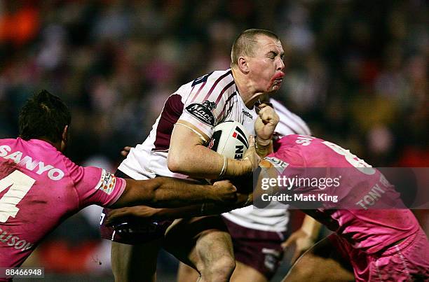 Glenn Hall of the Sea Eagles takes on the defence during the round 14 NRL match between the Penrith Panthers and the Manly Warringah Sea Eagles at...