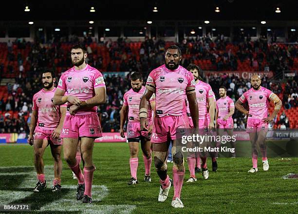 Panthers players walk from the field after the round 14 NRL match between the Penrith Panthers and the Manly Warringah Sea Eagles at CUA Stadium on...