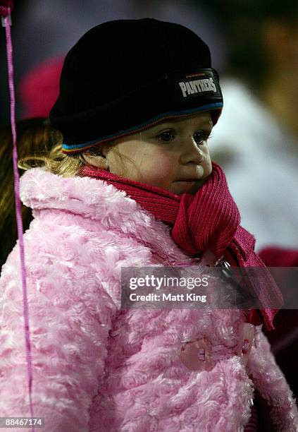 Young Panthers fan wears pink during the round 14 NRL match between the Penrith Panthers and the Manly Warringah Sea Eagles at CUA Stadium on June...