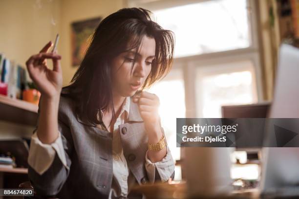 coughing from cigarettes. - smoking issues stock pictures, royalty-free photos & images