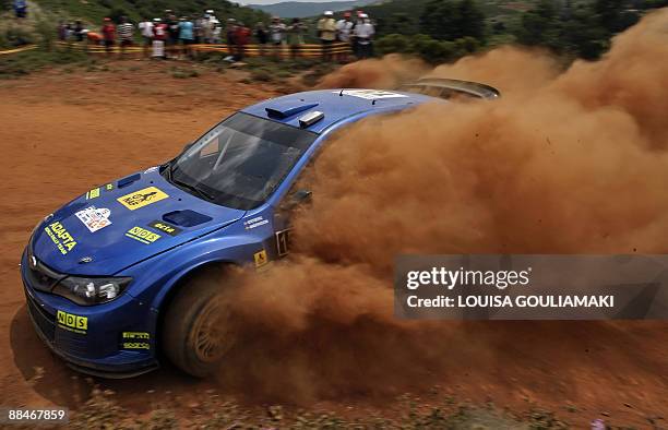 Norway's Mads Ostberg with Swedish Jonas Andersson drive their Subaru Impreza at Kefalari special stage on the day two of the WRC Rally Acropolis...