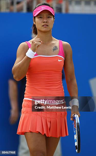 Na Li of China in action against Maria Sharapova of Russia during day Six of the AEGON Classic at the Edgbaston Priory Club on June 13, 2009 in...