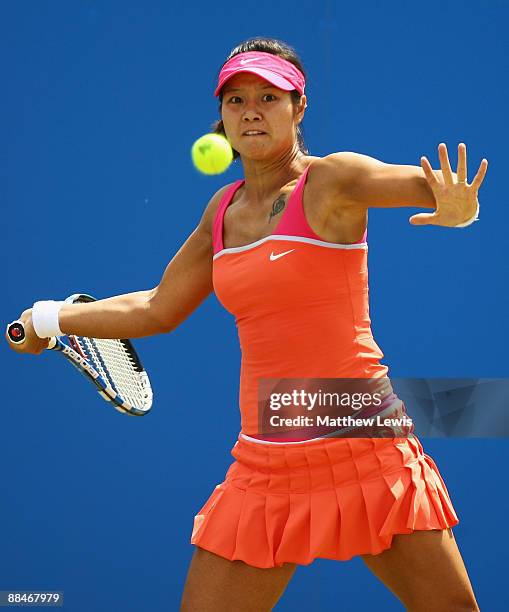 Na Li of China in action against Maria Sharapova of Russia during day Six of the AEGON Classic at the Edgbaston Priory Club on June 13, 2009 in...