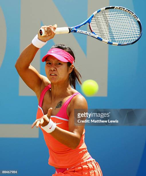 Na Li of China in action against Maria Sharapova of Russia during day Six of the AEGON Classic at the Edgbaston Priory Club on June 13, 2009 in...