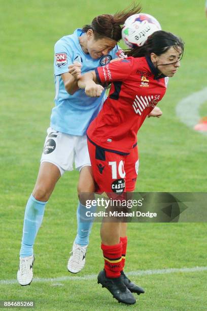 Yukari Kinga of the City and Alex Chidiac of United compete for the ball during the round six W-League match between Melbourne City and Adelaide...